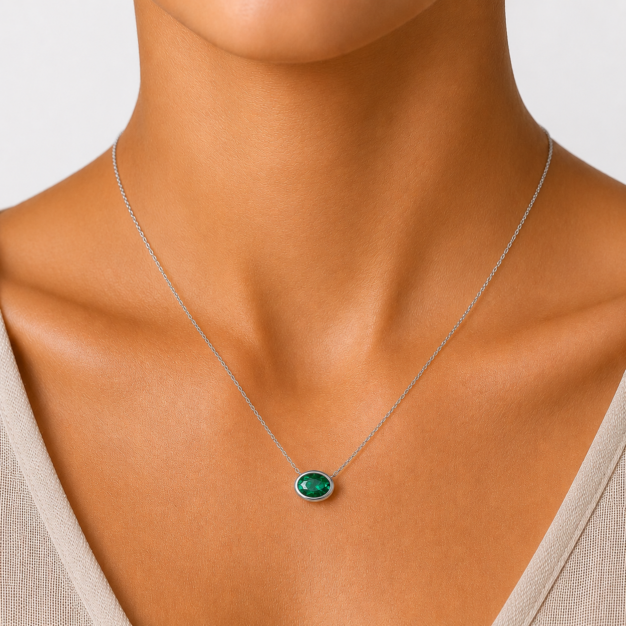Azure Halo Emerald Bezel Pendant in 18K Gold