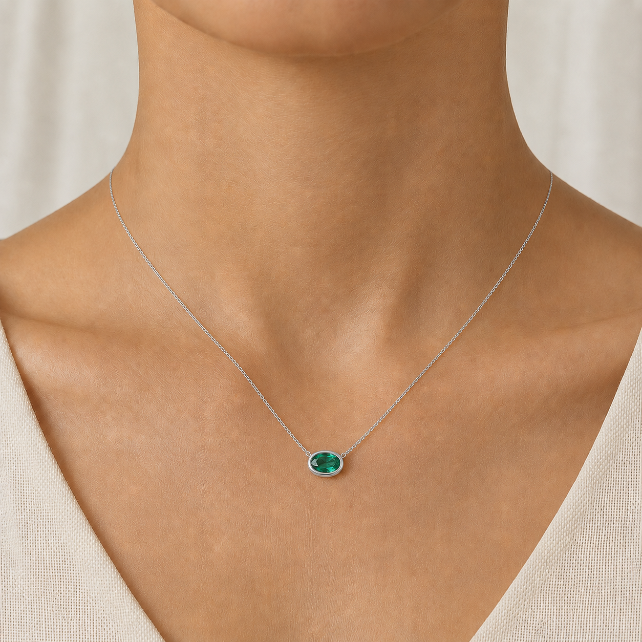 Azure Halo Emerald Bezel Pendant in 18K Gold