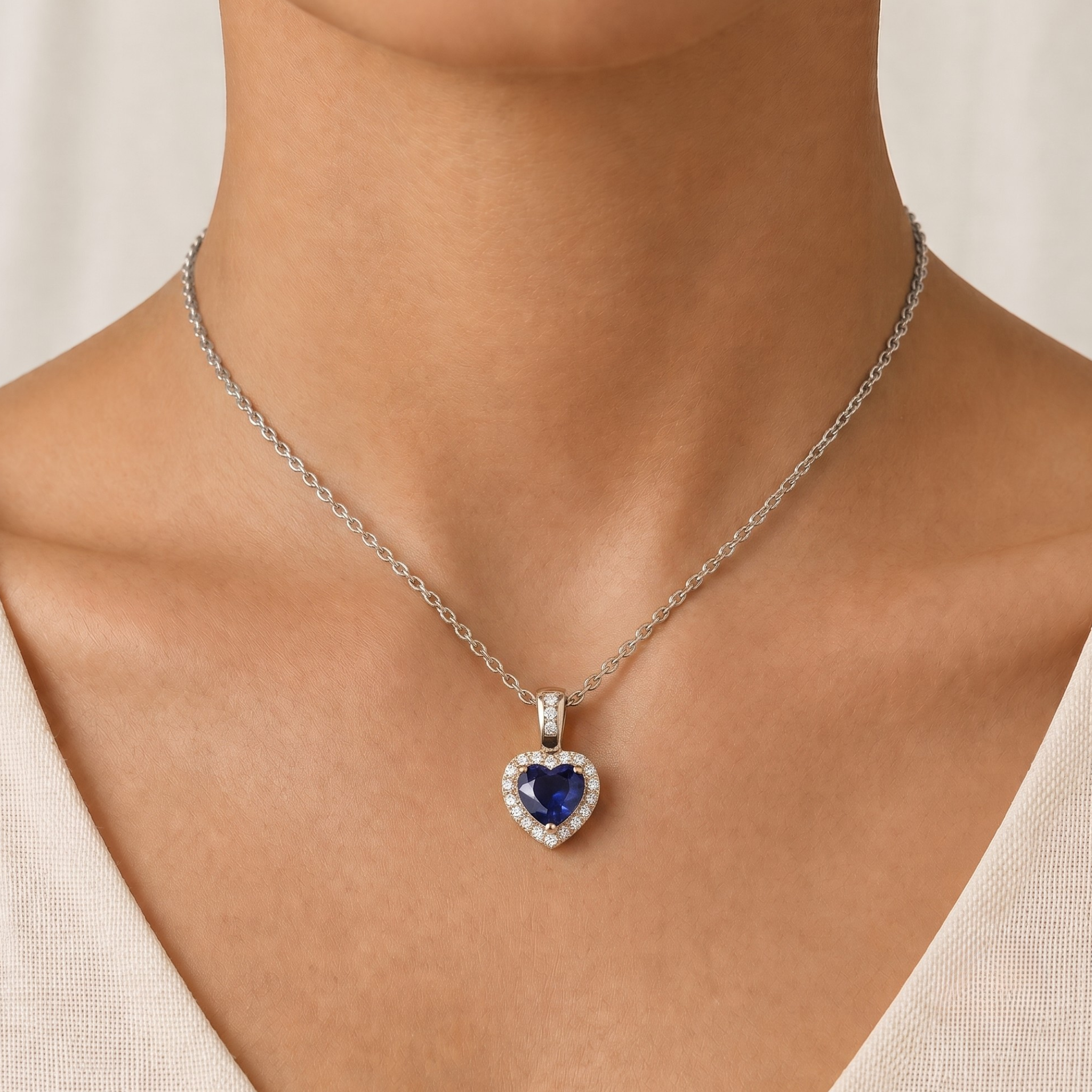 Blue Sapphire & Diamond Heart Pendant in 18K Gold