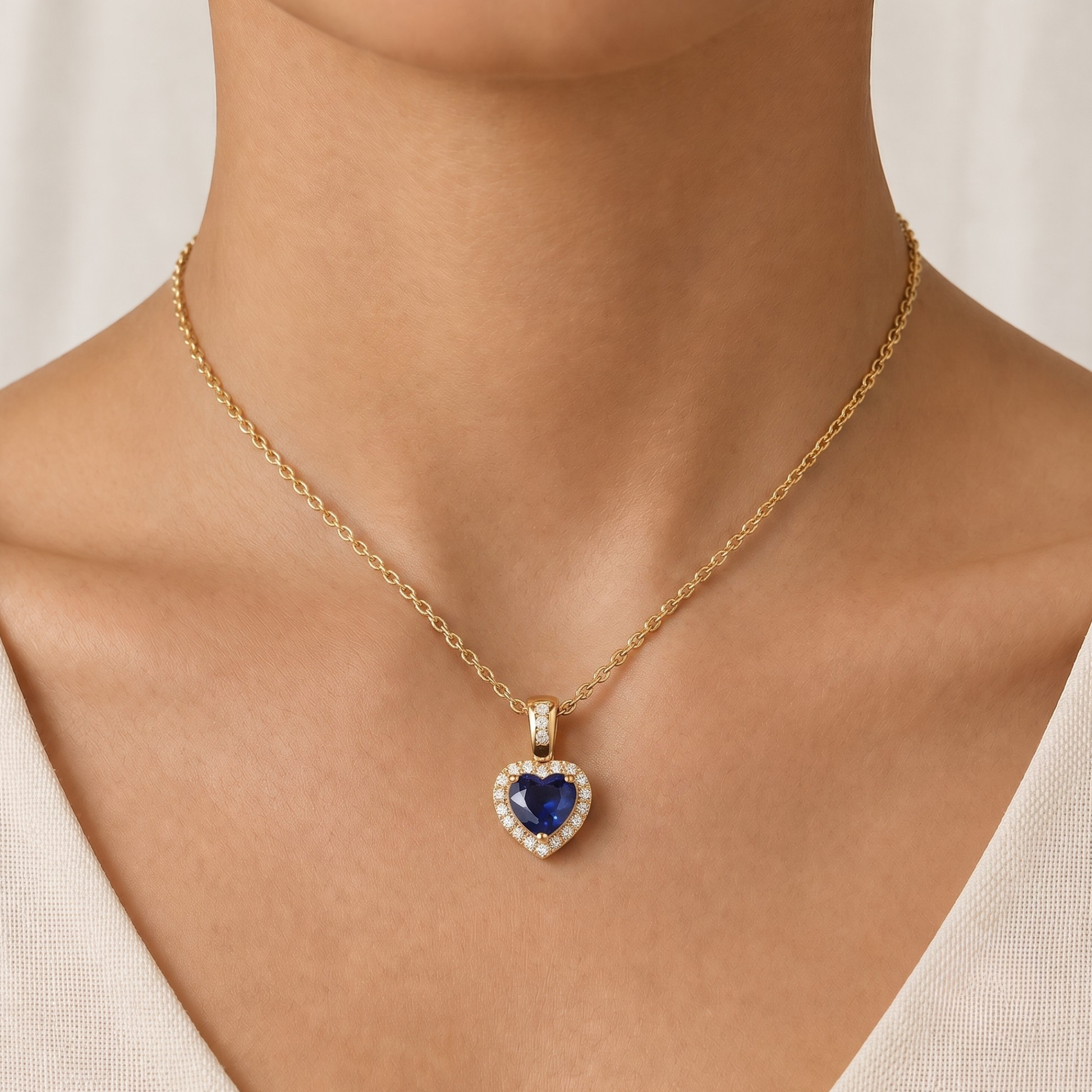 Blue Sapphire & Diamond Heart Pendant in 18K Gold