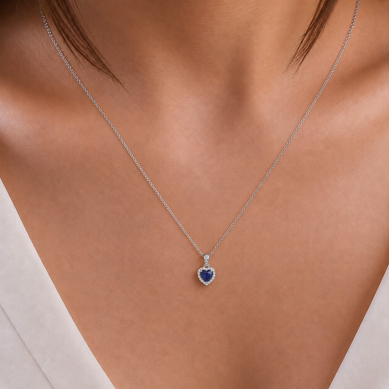 Blue Sapphire & Diamond Heart Pendant in 18K Gold