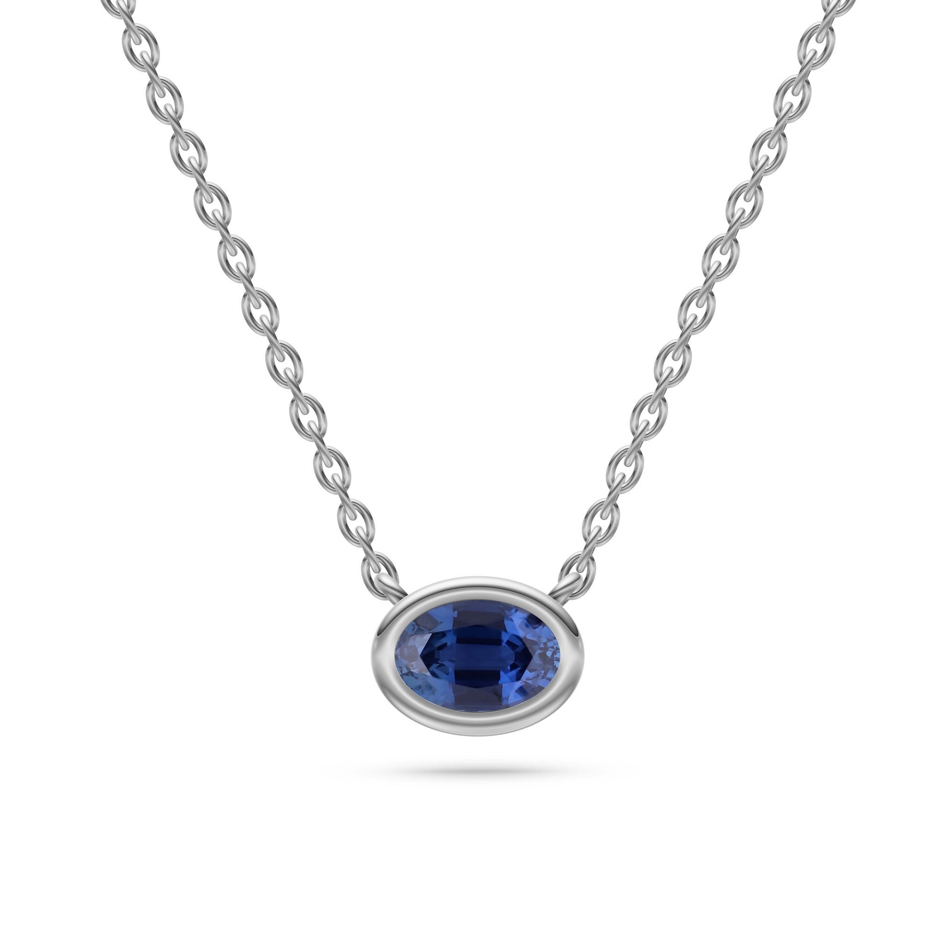 Azure Halo Blue Sapphire Bezel Pendant in 18K Gold
