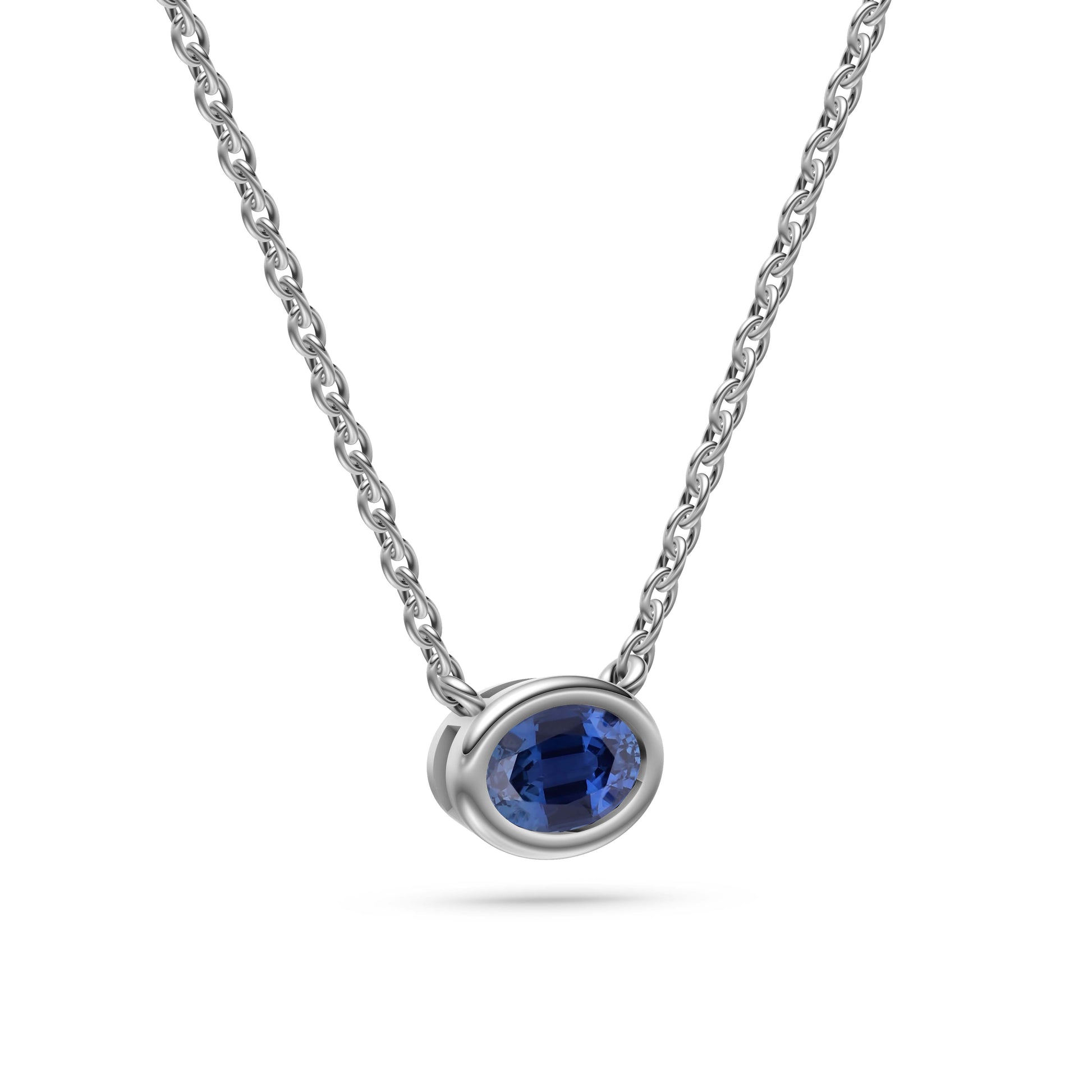 Azure Halo Blue Sapphire Bezel Pendant in 18K Gold