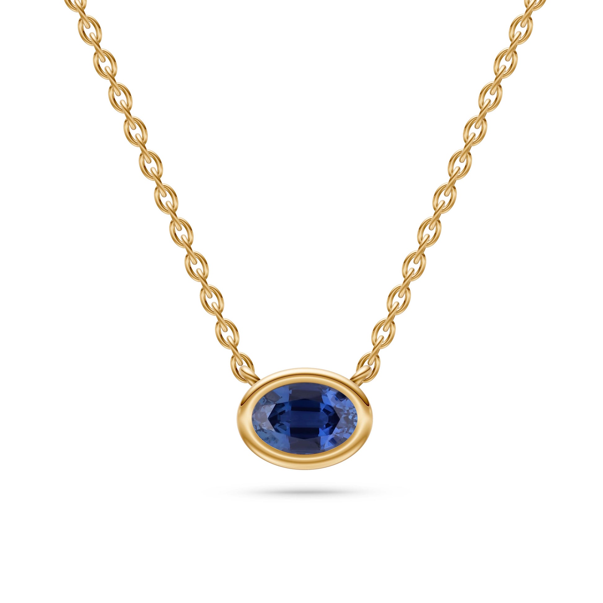 Azure Halo Blue Sapphire Bezel Pendant in 18K Gold