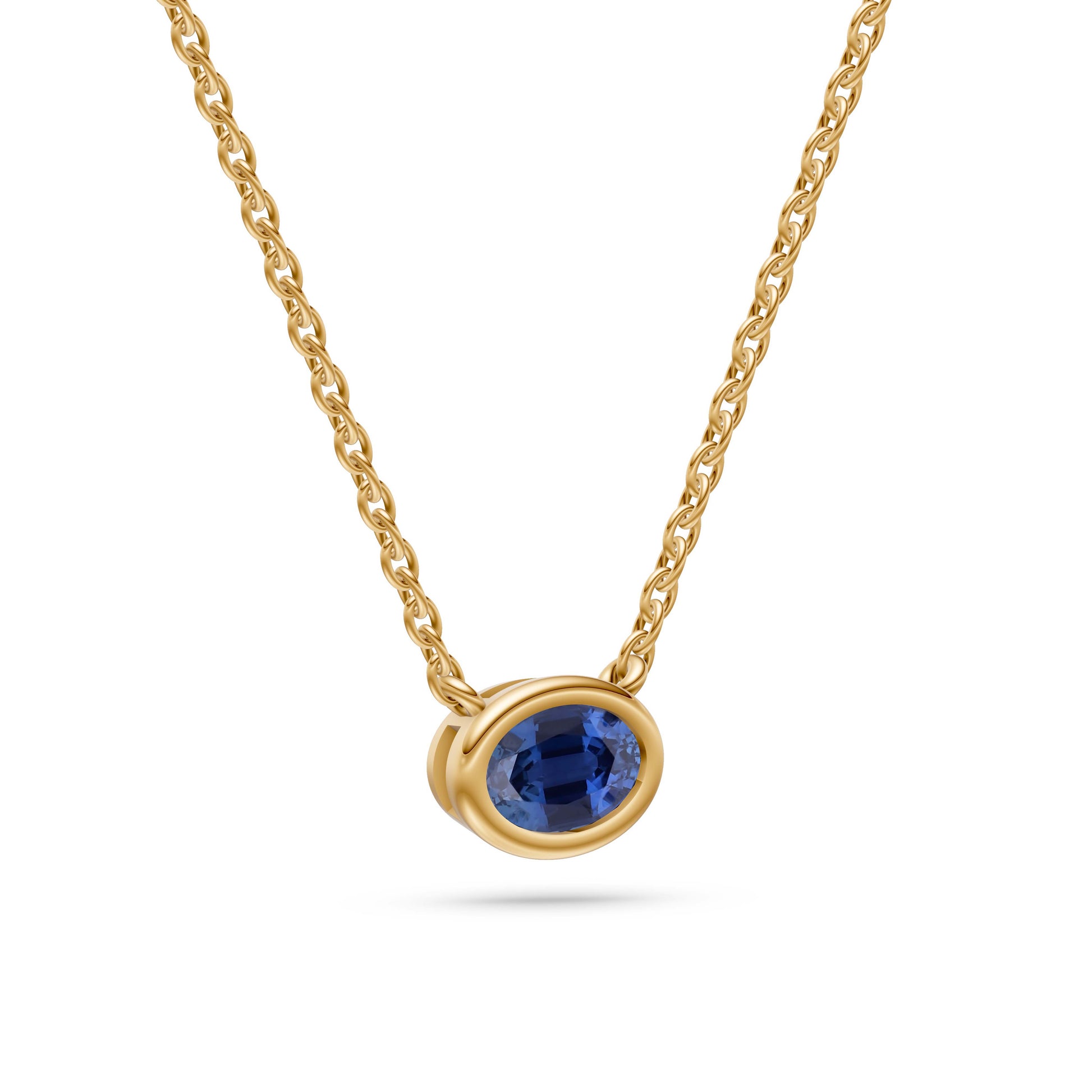 Azure Halo Blue Sapphire Bezel Pendant in 18K Gold